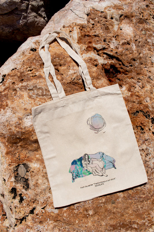 GIRL ON A COUCH TOTE BAG
